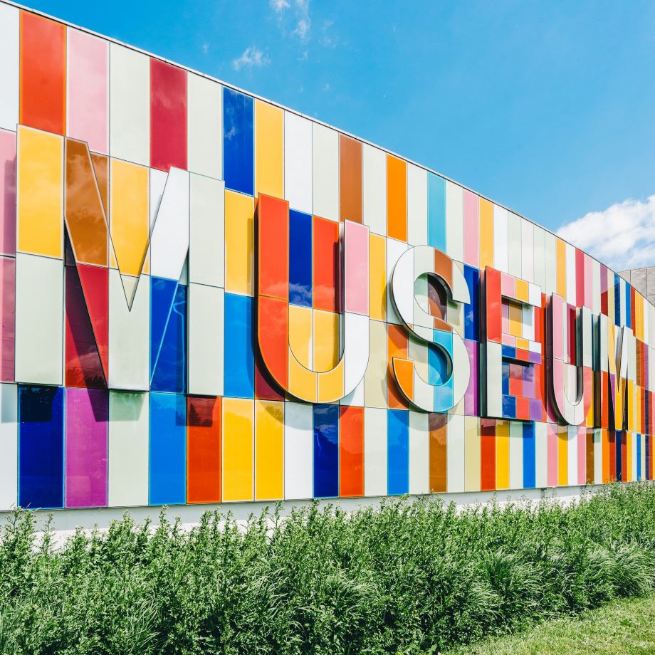 Picture of the outside of a colorful museum.